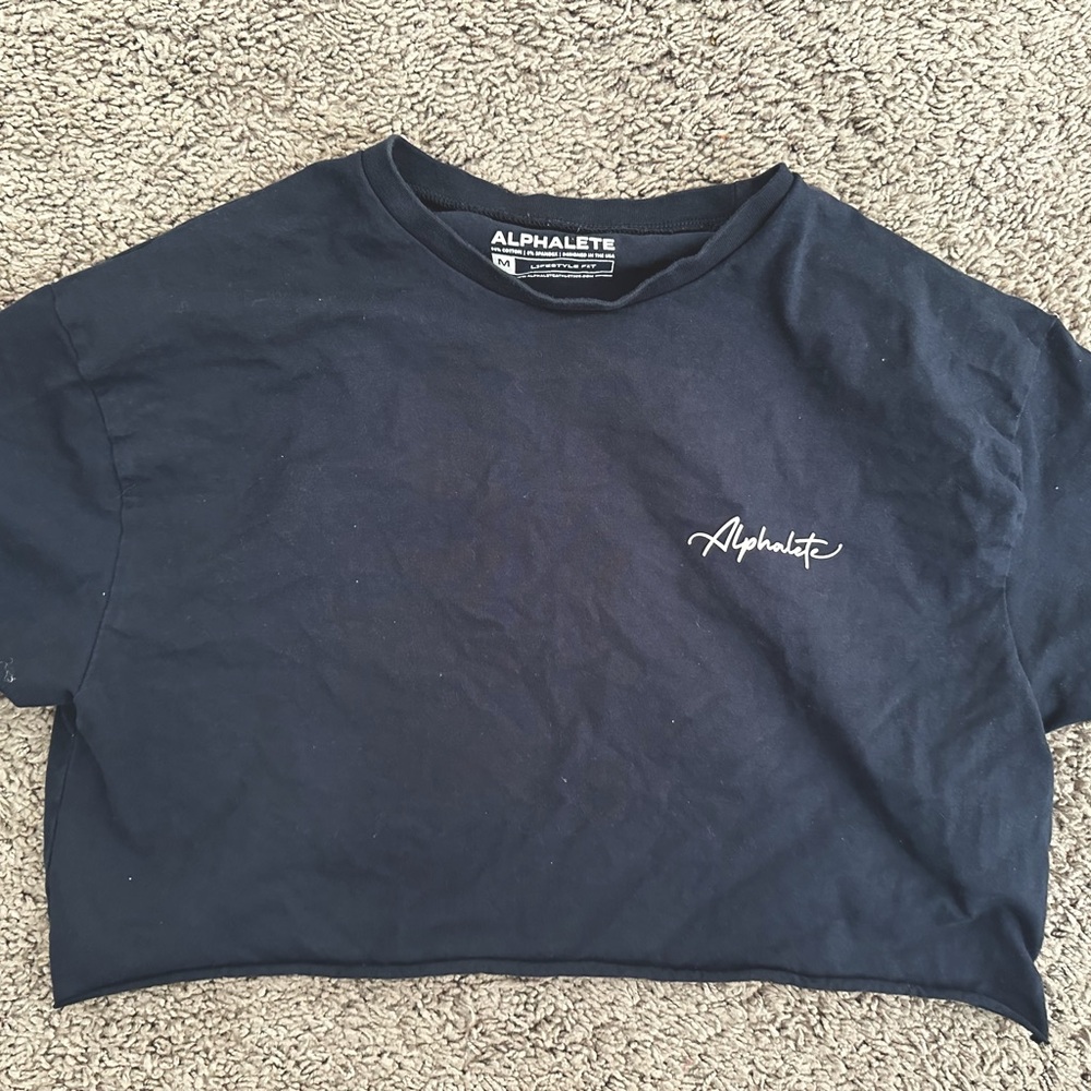 Cropped tee color is a dark navy blue